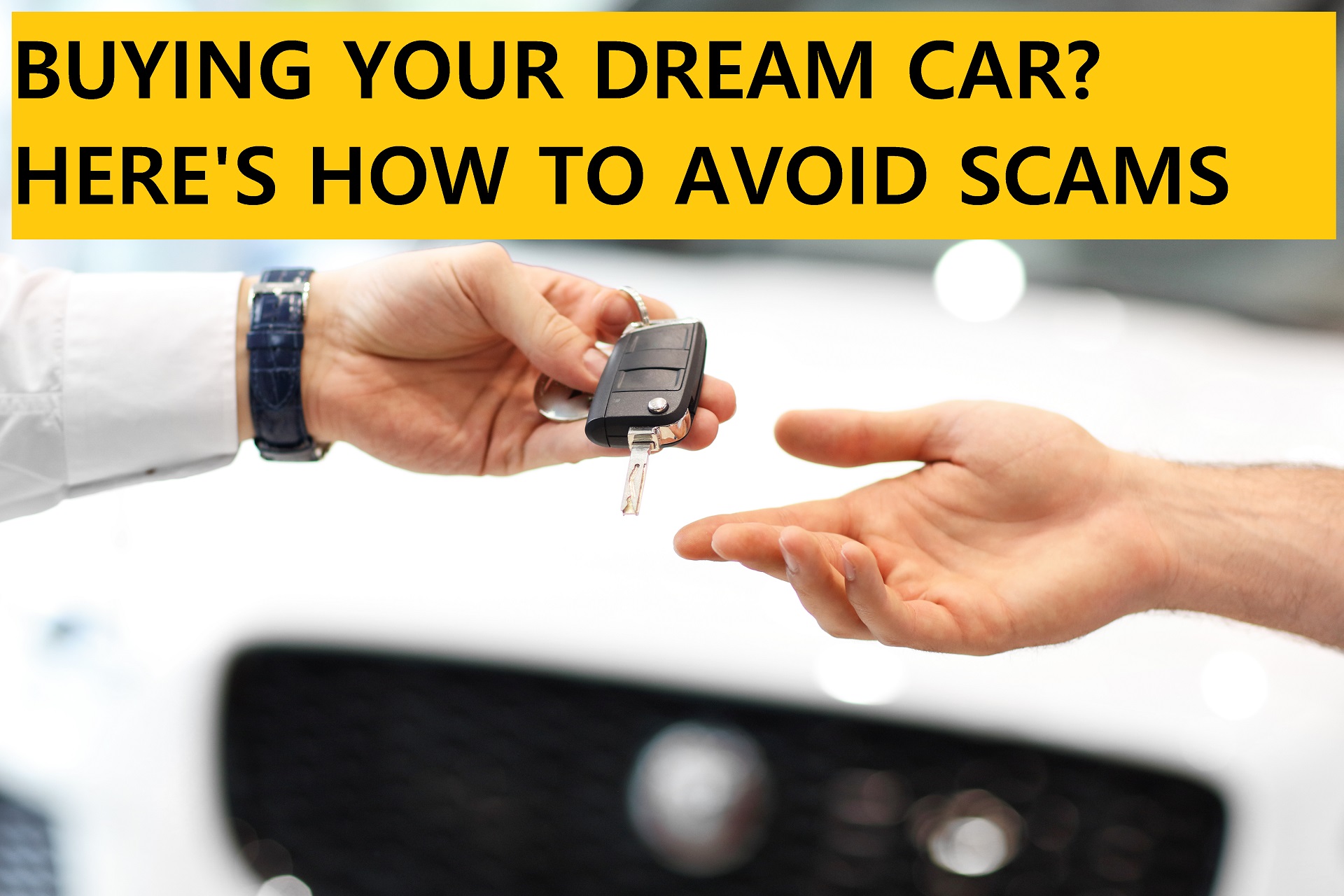 Hands exchanging car keys