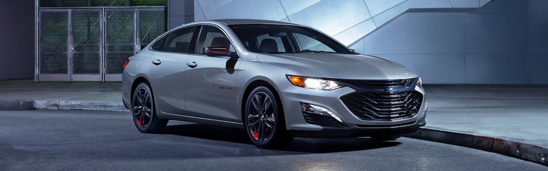 2024 silver chevy malibu down the road